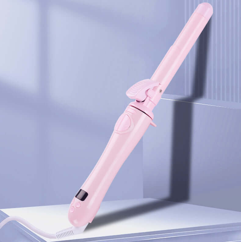 Innovative automatic curling iron creating bouncy curls with the press of a button